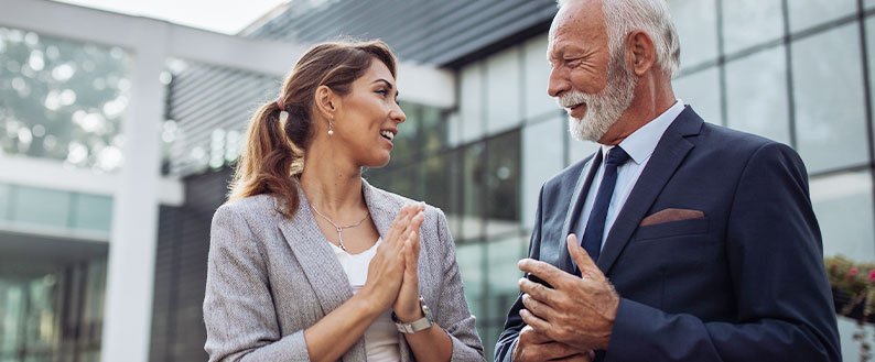 business people talking outside