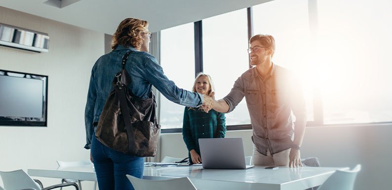 man handshaking employer
